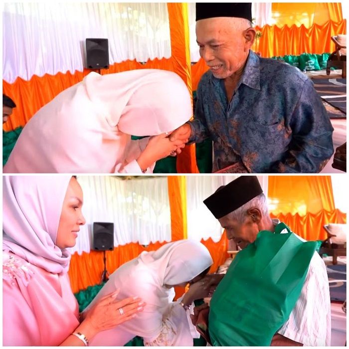 Nikita Mirzani mencium tangan para orang tua yang mendapatkan santunanya (YouTube/Crazy Nikmir REAL)