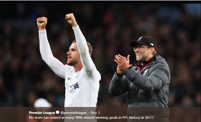 Juergen Klopp (kanan) dan Jordan Henderson merayakan kemenangan Liverpool.