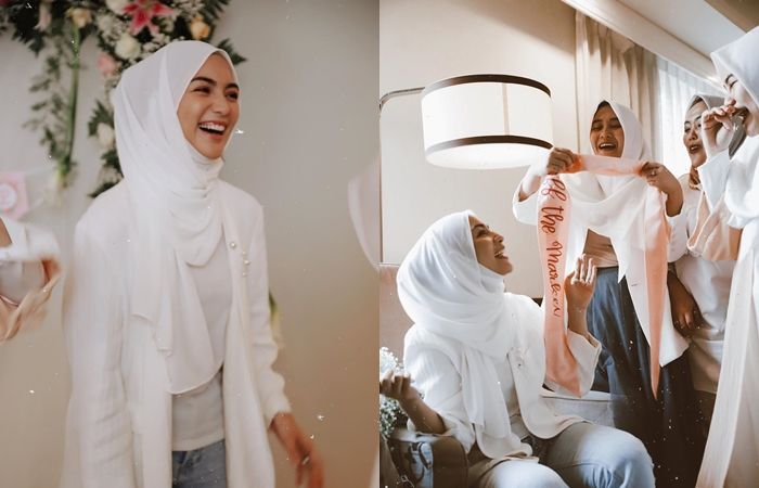 Tampilan Citra Kirana saat bridal shower dengan busana nuansa putih