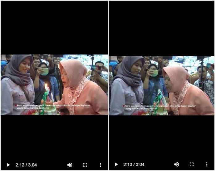Bu Risma saat tiup lilin
