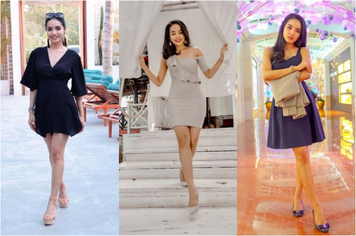 Penampilan seksi dan memikat Sisi Asih Pramugari Garuda dengan mini dress yang memamerkan kakinya yang jenjang