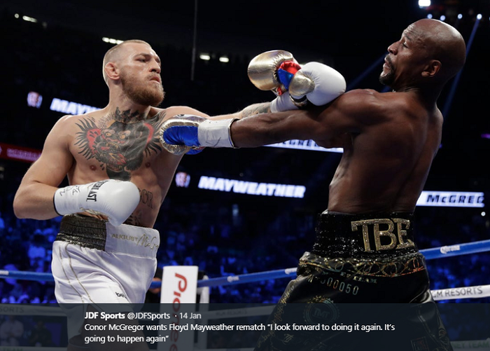 Floyd Mayweather Jr (kanan) menghadapi Conor McGregor di T-Mobile Arena, Las Vegas, Agustus 2017. Mayweather menang melalui TKO pada ronde ke-10.