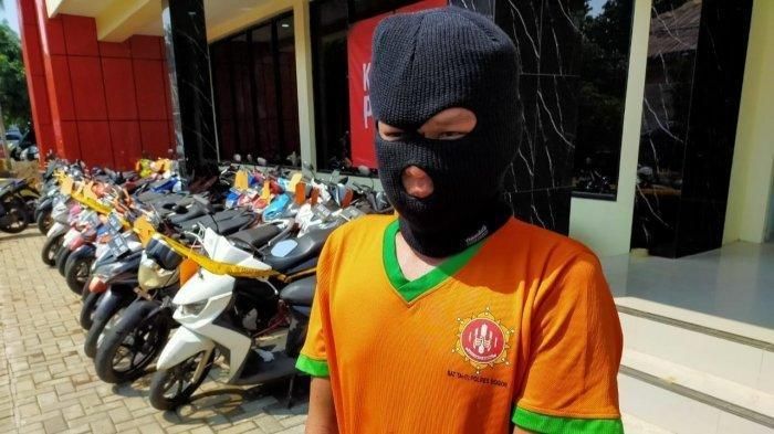 Pelaku RA (39) saat dihadirkan dalam kegiatan rilis kasus di Mapolres Bogor, Jumat (17/1/20290)