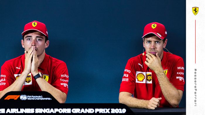 Dua pembalap Ferrari, Charles Leclerc dan Sebastian Vettel, saat konferensi pers prabalapan Formula 1 GP Singapura di Sirkuit Jalan Raya Marina Bay, 19 September 2019.