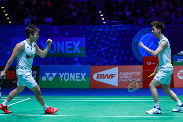 Ekspresi ganda putra Indonesia, Marcus Fernaldi Gideon/Kevin Sanjaya Sukamuljo pada semifinal All England Open 2020, Sabtu (14/3/2020)