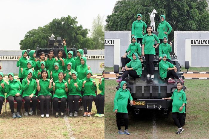 Annisa Pohan bersama anggota Persit berpose di kendaraan tempur