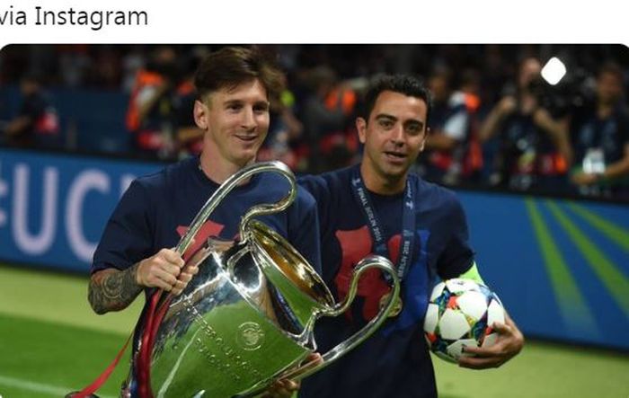 Lionel Messi dan Xavi Hernandez merayakan keberhasilan Barcelona menjuarai Liga Champions.