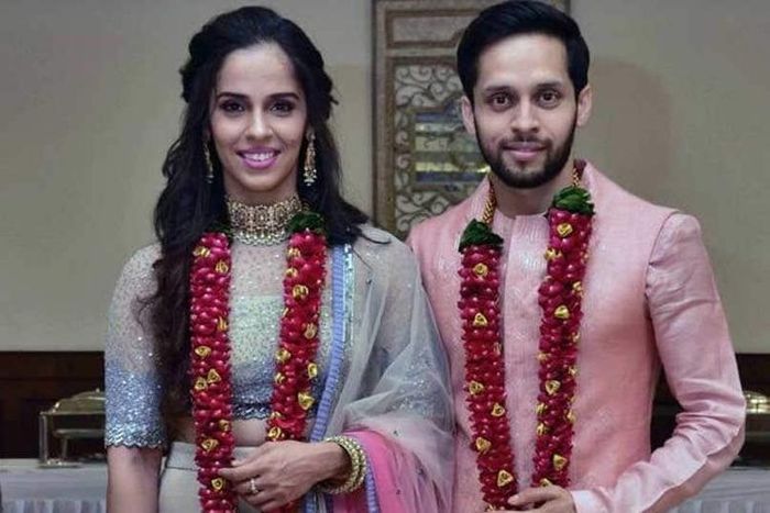 Pebulu tangkis India, Saina Nehwal (kiri) dan Parupalli Kashyap.