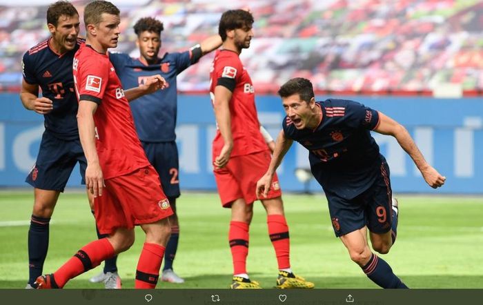 Robert Lewandowski saat berhasil mencetak gol ke gawang Bayer Leverkusen dalam laga pekan ke-30 Bundesliga 2019-2020.