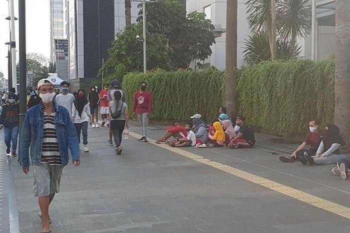 nak-anak tampak beraktivitas di area car free day Sudirman-Thamrin Jakarta, Minggu (21/6/2020).