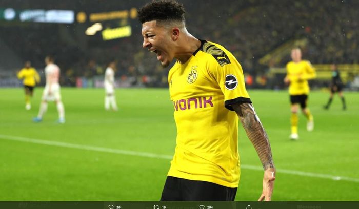 Penyerang Borussia Dortmund, Jadon Sancho, saat melakukan selebrasi usai mencetak gol.