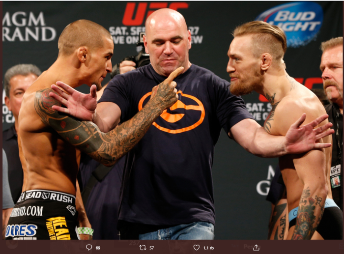 Saat Dustin Poirier (kiri) dan Conor McGregor (kanan) melakukan sesi tatap muka pada ajang UFC 178. 