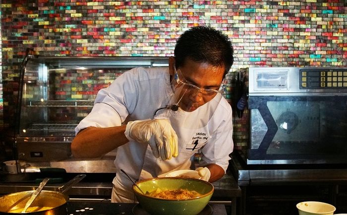 Executive Chef Salihin demonstrates how to whip up Laksa Tangerang.