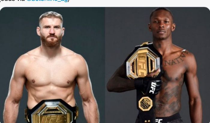 Juara kelas berat ringan, Jan Blachowicz (kiri), dengan Juara kelas menengah, Israel Adesanya (kanan)