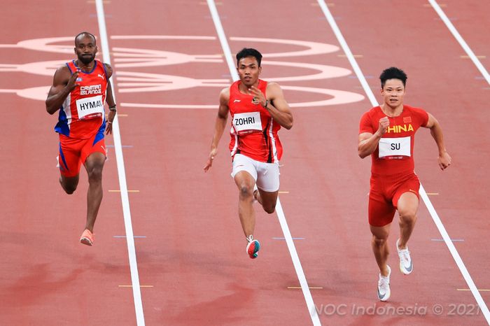 Sprinter Indonesia, Lalu Muhammad Zohri (tengah), saat tampil pada babak utama 100m putra cabang olahraga atletik, di Olympic Stadium, Tokyo, Sabtu (31/7/2021).