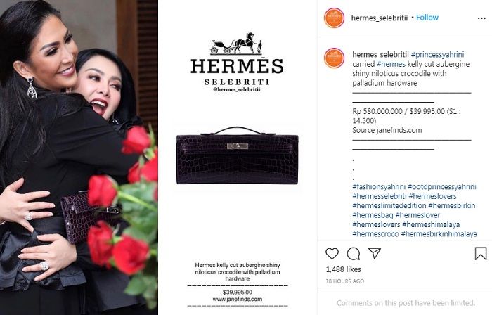 Penampilan Syahrini tenteng dompet kulit buaya keluaran Hermes