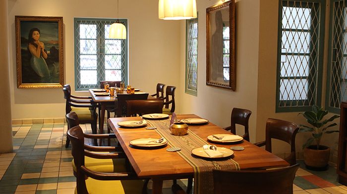 Kaum reminisces mid-century modern design combines with traditional touches like relief walls and tribal-motif fabric as decorations.