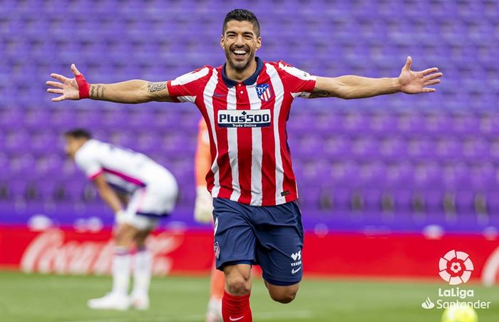 Striker Atletico Madrid, Luis Suarez, saat merayakan golnya ke gawang Getafe dalam partai Liga Spanyol.