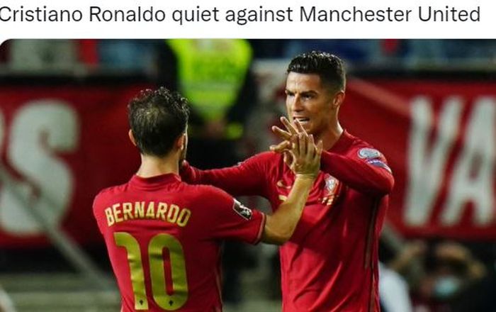 Dua pemain timnas Portugal, Bernardo Silva dan Cristiano Ronaldo, melakukan selebrasi.