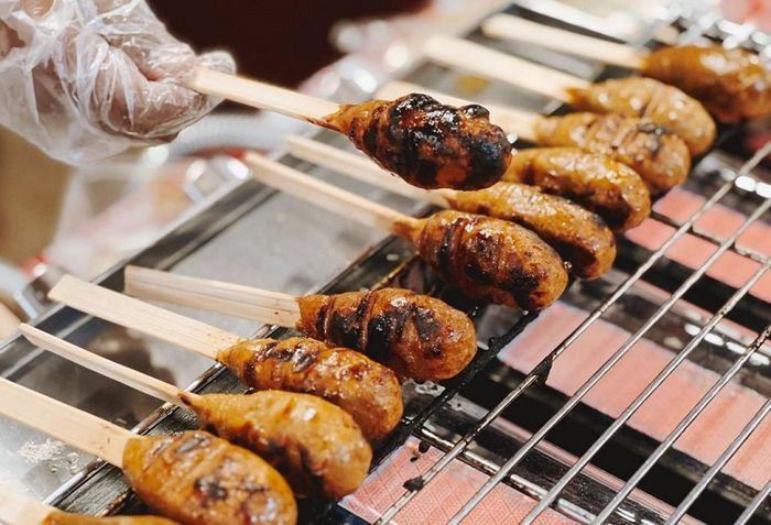 Visitors can enjoy a plethora of Balinese dishes at Festival Kuliner Serpong. On picture: sate lilit (minced satay).