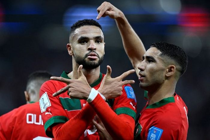 Youssef En-Nesyri merayakan gol dalam duel timnas Maroko vs Portugal pada perempat final Piala Dunia 2022 di Al Thumama, Doha (10/12/2022).