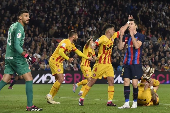 Robert Lewandowski dan Barcelona dibuat gagal cetak gol dalam laga kontra Girona pada lanjutan Liga Spanyol 2022-2023.