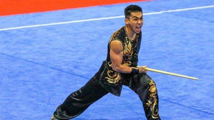 Atlet Wushu Harris Horatius dari Sumatra Utara, beraksi di penyisihan nomor Nan Gun putra di GOR Hiad Sai Trikora Merauke, PON XX Papua. Jumat (01/10/2021).