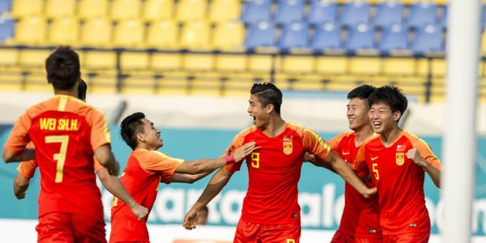 Suka cita pemain timnas U-23 China seusai mencetak gol ke gawang timnas U-23 Timor Leste pada laga p
