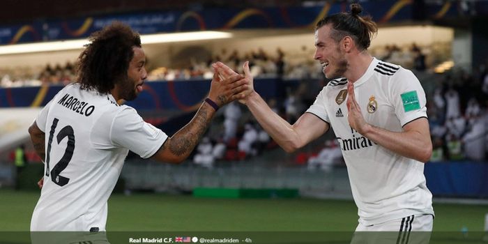 Penyerang Real Madrid, Gareth Bale (kanan), merayakan golnya bersama Marcelo.