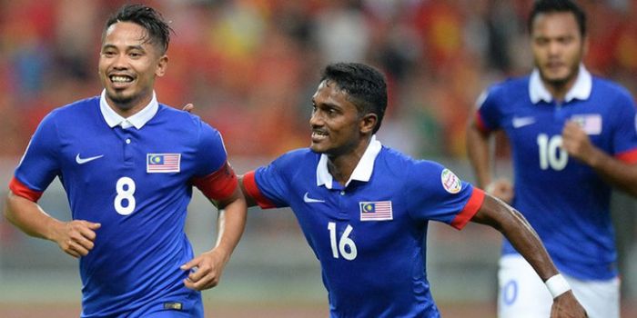  Gelandang Safiq Rahim (kiri) bernomor punggung 8 saat membela timnas Malaysia.  