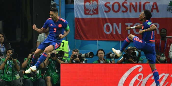 Penyerang Kolombia, Radamel Falcao, merayakan gol yang dicetak ke gawang Polandia dalam laga Grup H 