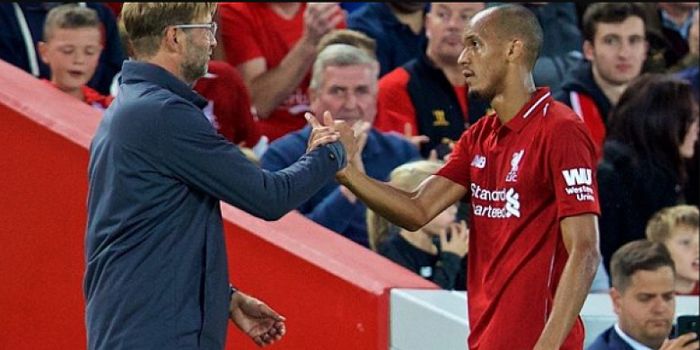 Juergen Klopp (kiri) dan Fabinho (kanan).