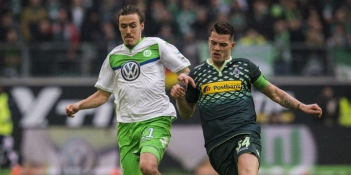 Penyerang Vfl Wolfsburg, Max Kruse (kiri), dalam pertandingan Bundesliga melawan Borussia Moenchengl