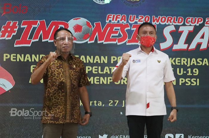 Ketua Umum PSSI, Mochamad Iriawan dan Menteri Pemuda dan Olahraga Republik Indonesia, Zainudin Amali, bersinergi dalam acara penandatanganan perjanjian kerja sama (MoU) antara PSSI dengan Kemenpora di Auditorium Wisma Menpora, Senayan, Jakarta (27/7/2020).