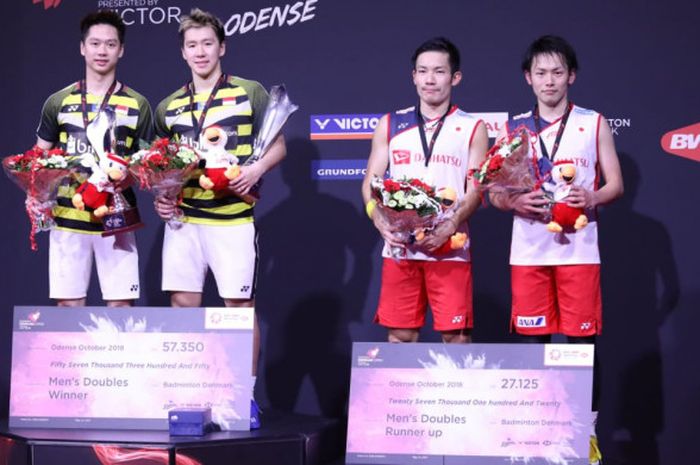 Juara ganda putra Denmark Open 2018 yaitu Marcus Fernaldi Gideon/Kevin Sanjaya Sukamuljo (Indonesia)