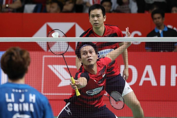 Pasangan ganda putra Indonesia, Mohammad Ahsan/Hendra Setiawan, saat menjalani laga  melawan Li Junhui/Liu Yuchen pada babak perempat final Indonesia Masters 2019 di Istora Senayan, Jakarta, Jumat (25/1/2019).