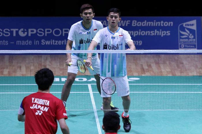 Pasangan ganda putra Indonesia, Fajar Alfian/Muhammad Rian Ardianto, saat bertanding pada babak pertama Swiss Open 2019, Rabu (13/3/2019).
