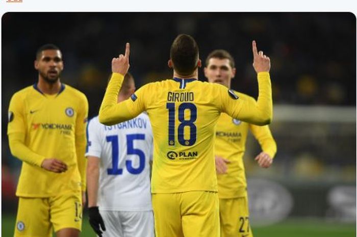 Striker Chelsea, Olivier Giroud, merayakan gol yang dicetak ke gawang Dynamo Kyiv dalam laga leg kedua babak 16 besar Liga Europa di Stadion NSK Olimpiyskyi, Kamis (14/3/2019).