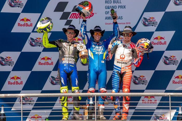 Dari kiri-kanan: Valentino Rossi, Alex Rins, dan Jack Miller ketika merayakan posisi podium pada MotoGP Americas 2019.