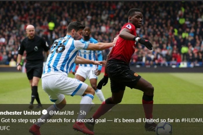 Aksi gelandang Manchester United, Paul Pogba, dalam duel melawan Huddersfield Town pada ajang Liga Inggris, Minggu (5/5/2019)