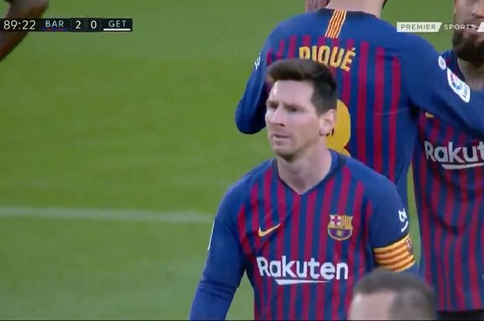 Ekspresi megabintang Barcelona, Lionel Messi, seusai timnya mencetak gol ke gawang Getafe dalam laga Liga Spanyol di Stadion Camp Nou, Minggu (12/5/2019).