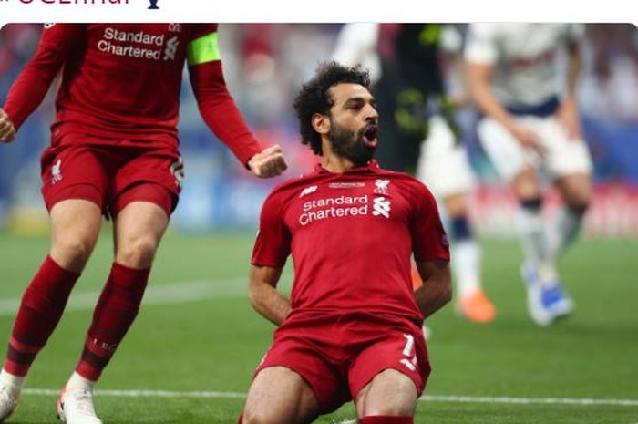 Penyerang Liverpool, Mohamed Salah, merayakan gol ke gawang Tottenham Hotspur dalam laga final Liga Champions di Stadion Wanda Metropolitano, Sabtu (1/6/2019).