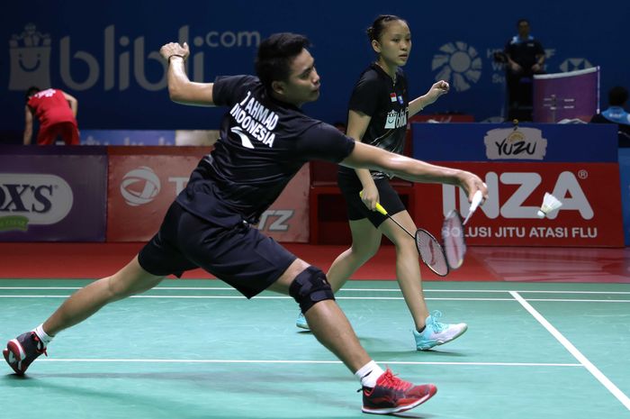 Pasangan ganda campuran Indonesia, Tontowi Ahmad/Winny Oktavina Kandow, menjalani pertandingan babak kedua Indonesia Open 2019 di Istora Senayan, Jakarta, Kamis (18/7/2019).