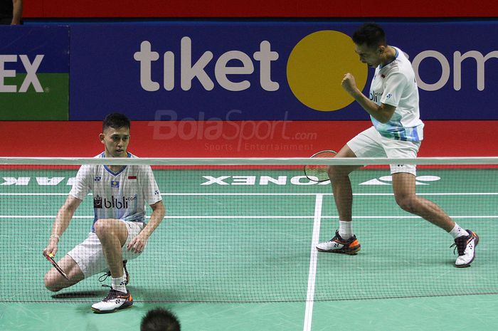 Pebulutangkis ganda putra Indonesia Fajar Alfian/Muhammad Rian Ardianto saat melawan pebulutangkis ganda putra asal China Huang Kai Xiang/Liu Cheng dalam turnamen bulutangkis Indonesia Open 2019 di Senayan, Jakarta, Selasa (17/7/2019) Fajar Alfian, Indonesia Muhammad Rian Ardianto berhasil maju keba