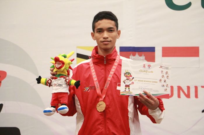 Selebrasi Atlet pencak silat Indonesia pada ASG 2019, M. Zaki Zikirillah meraih medali emas, Senin (22/7/2019)