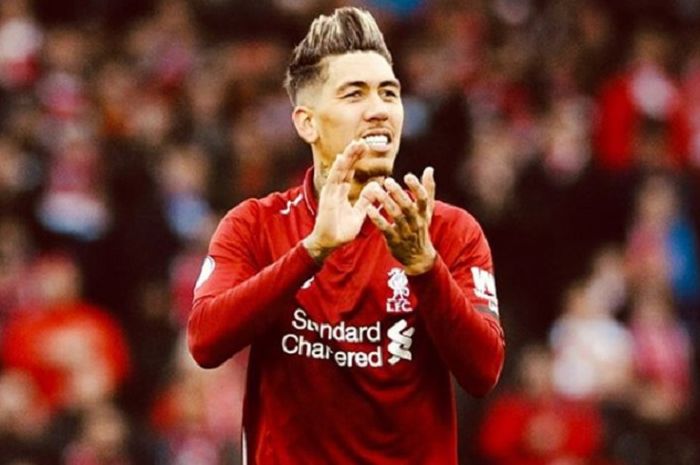 Penyerang Liverpool, Roberto Firmino disorot media Inggris karena pamer tato baru bertema Liga Champions.