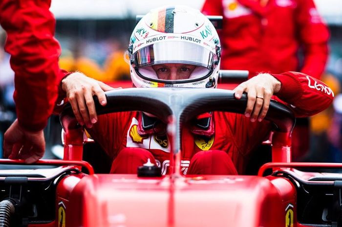 Pembalap Ferrari, Sebastian Vettel saat melakukan persiapan untuk babak kualifikasi F1 Hungaria 2019, Sabtu (3/8/2019)