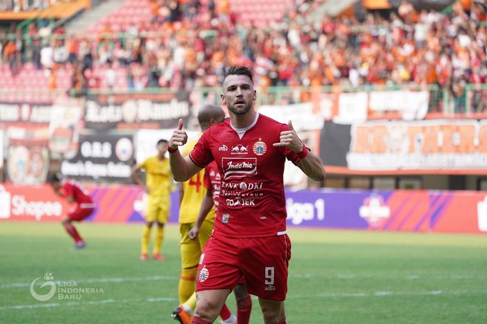 Striker Persija Jakarta, Marko Simic merayakan golnya ke gawang Bhayangkara FC, di Stadion Patriot Chandrabhaga, Kota Bekasi, Sabtu (10/8/2019).