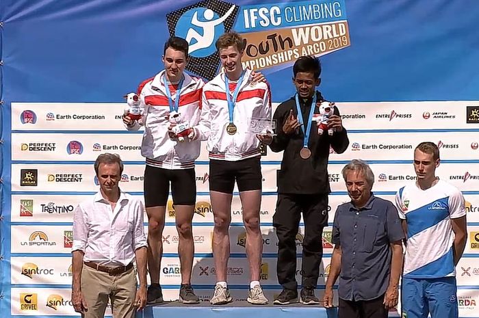 Atlet panjat tebing junior Indonesia, emanjat tebing junior Indonesia, Adi (jersey hitam), menyabet perunggu speed junior putra dalam ajang IFSC Youth World Championships di Arco, Italia, 22-31 Agustus