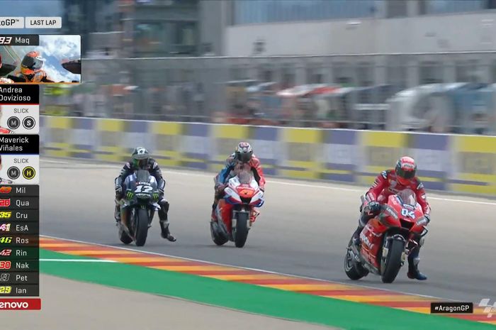 Dua pembalap Ducati, Andrea Dovizioso dan Jack Miller, bertarung melawan Maverick Vinales (Yamaha) di MotoGP Aragon 2019, Minggu (22/9/2019).